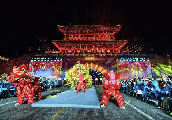 圖為活動在長汀古城濟川門前舉行。 中新社